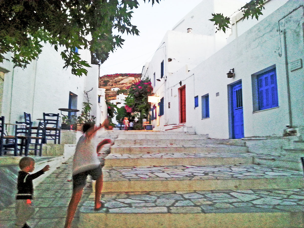 tinos-greek-island-beaches-tourism-pyrgos-village-playing-children